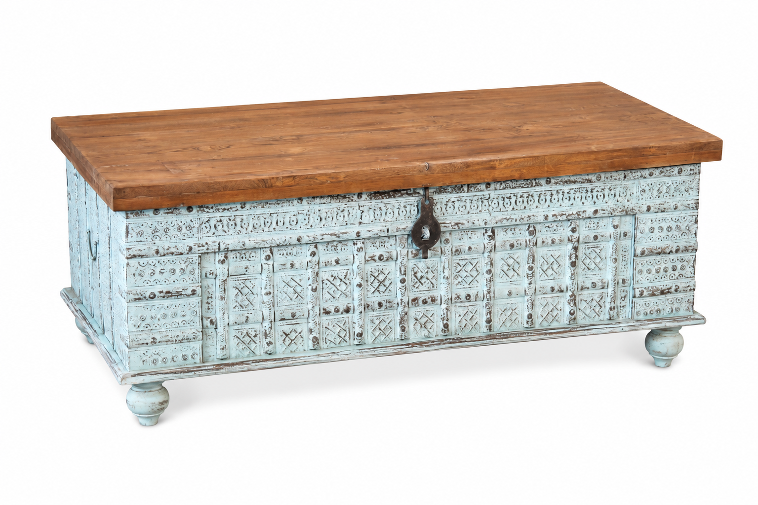 White background image of a antique Indian chest coffee table in blue with brass fittings – solid teak iron fitted wooden chest repurposed as living room table with storage.