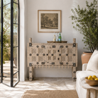 Lifestyle image of an sandblasted antique Indian teak chest with hand-carved details, original iron fittings, and a naturally aged finish, ideal for bohemian or vintage-inspired interiors.