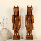 Pair of hand-carved Indian house guardian statues in exotic style, made from reclaimed wood; sustainable furniture, 40 × 20 × 120 cm.