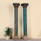 Antique pair of carved wooden house pillars with original stone bases, weathered multicolour finish, 210 cm high, vintage home decor and boho chic living room accents.