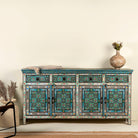 Hand painted furniture sideboard made from reclaimed teak wood with floral motifs, artisanal furniture in bohemian Mediterranean style, 180 × 40 × 90 cm.
