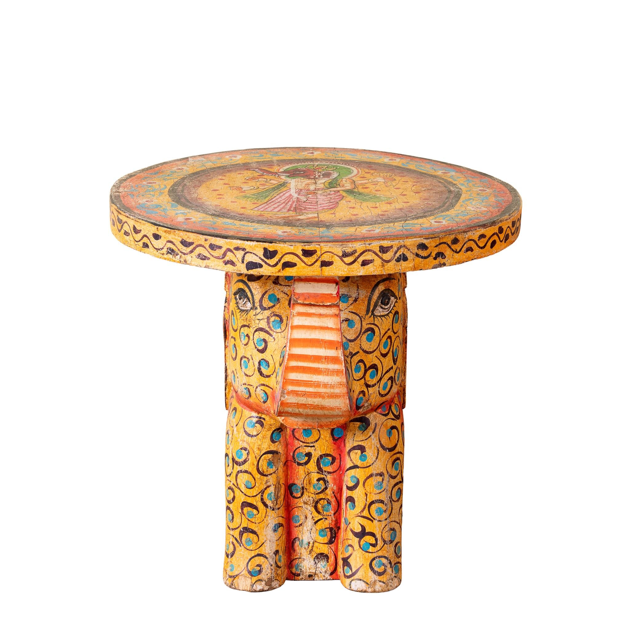 Leo hand painted solid wood elephant side table with traditional Indian artwork, available in yellow, red, and turquoise boho style designs.