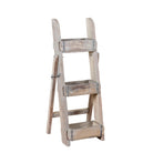 White background image of a Liam reclaimed wood ladder shelf crafted from original Indian brick moulds with three storage compartments, 97cm