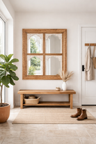 Lifestyle imagination of a hand-carved custom mirror Limbdi made from solid mango wood with floral motifs. A statement wooden wall decoration blending artisanal design with natural charm.