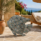 Lifestyle image of a Maah hand painted freestanding metal fish sculpture featuring Delft-inspired blue tile patterns with pink floral motifs, handcrafted decorative home accessory, 107x15x80cm.