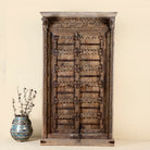 Mahika cabinet with antique carved teak door, part of our teak wood furniture collection, perfect for a bohemian interior.