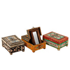 White background image of a hand-painted wooden jewellery box Manan with floral motifs and foldable mirror. A vintage home accessory and unique Indian decoration ideal for vintage home decor and storing jewellery or keepsakes.