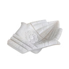 White background image of a white marble decorative bowl shaped like cupped hands with floral carving – hand-carved Indian marble accessory.