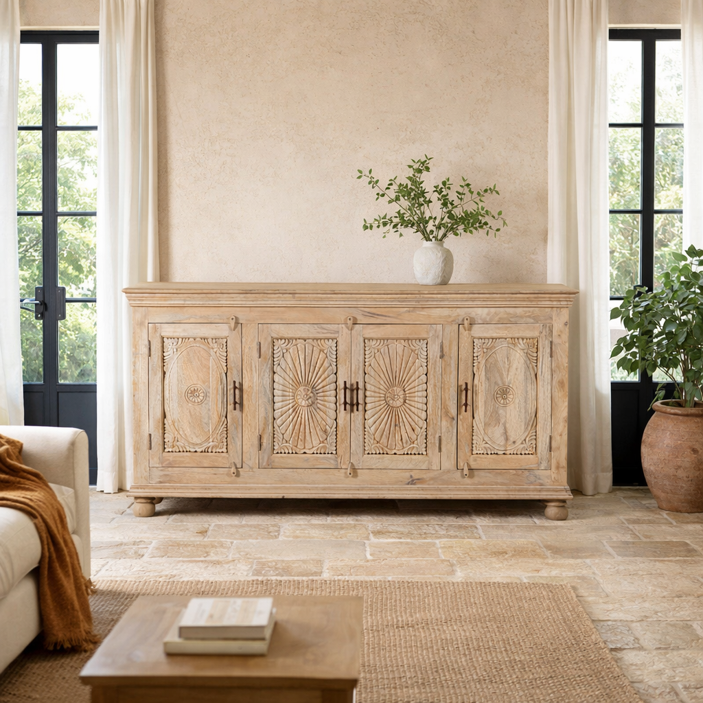 Lifestyle scene with a hand-carved mango wood sideboard with sandblasted finish – a rustic mango wood furniture piece ideal for Ibiza style interiors.