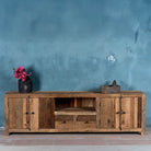 Sustainable driftwood sideboard with two drawers, open shelf, and cabinets; made from reclaimed wood, 200 × 45 × 60 cm.