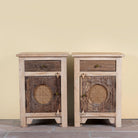 Milan hand carved reclaimed wood nightstands with woven rattan inserts, drawer storage, cabinet doors, and warm natural boho style design.