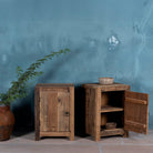Open door image of a reclaimed wood bedside table with single cabinet door – handcrafted driftwood furniture ideal for rustic minimalism and natural interior styling.