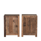 White background photo of a reclaimed wood bedside table with single cabinet door – handcrafted driftwood furniture ideal for rustic minimalism and natural interior styling.