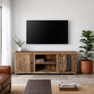 Lifestyle image of a driftwood lowboard made from reclaimed wood with two cabinets, open shelving, and rustic minimalist design, 150 × 40 × 60 cm.