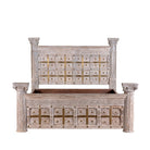 White background image of a handcrafted four poster bed made from reclaimed wood with carved detailing – Mirai model by Om Home & Garden