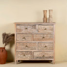 Carved mango wood cabinet with drawers and one door, made from reclaimed teak, 100 × 40 × 100 cm.