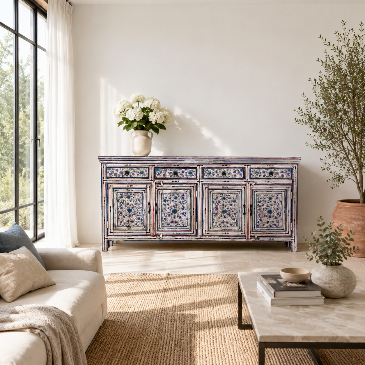 Lifestyle imagination of a hand painted wooden furniture sideboard with floral motifs, unique furniture piece made from reclaimed wood, 180 × 40 × 90 cm.