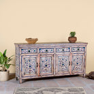 Side angle image of a hand painted wooden furniture sideboard with floral motifs, unique furniture piece made from reclaimed wood, 180 × 40 × 90 cm.