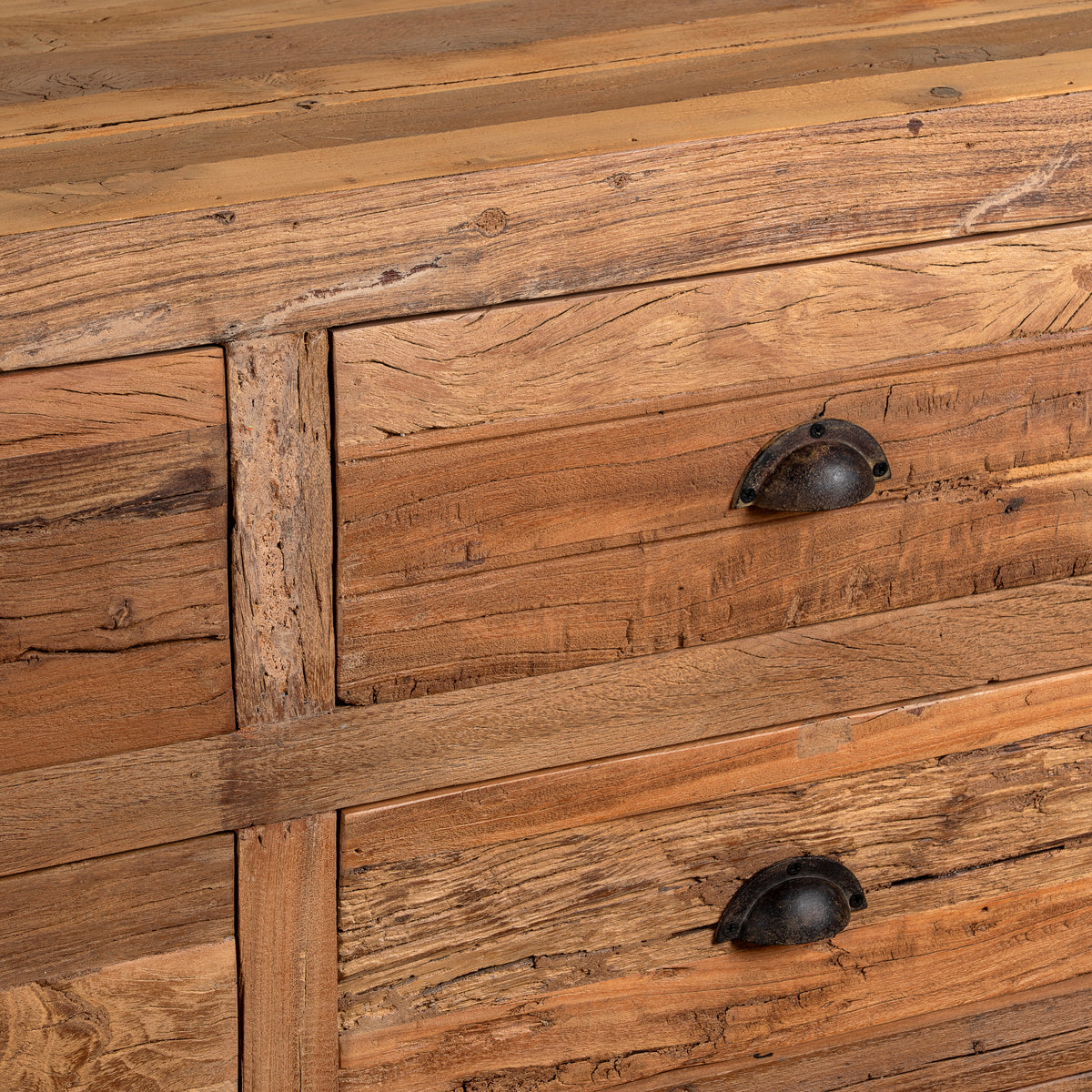 Close up image of a Nayel reclaimed wood chest of 9 drawers with dark metal cup handles in Japandi style, 180cm