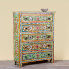 Close up image of a Neel hand painted reclaimed wood chest of drawers with five floral drawers and colourful boho vintage finish.