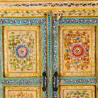 Close up image of a Nehrika hand painted reclaimed wood cabinet with colourful floral double doors and three storage compartments, 150cm