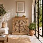 Lifestyle image of a Nellore hand carved solid mango wood cabinet with Indian carved doors 90x90cm