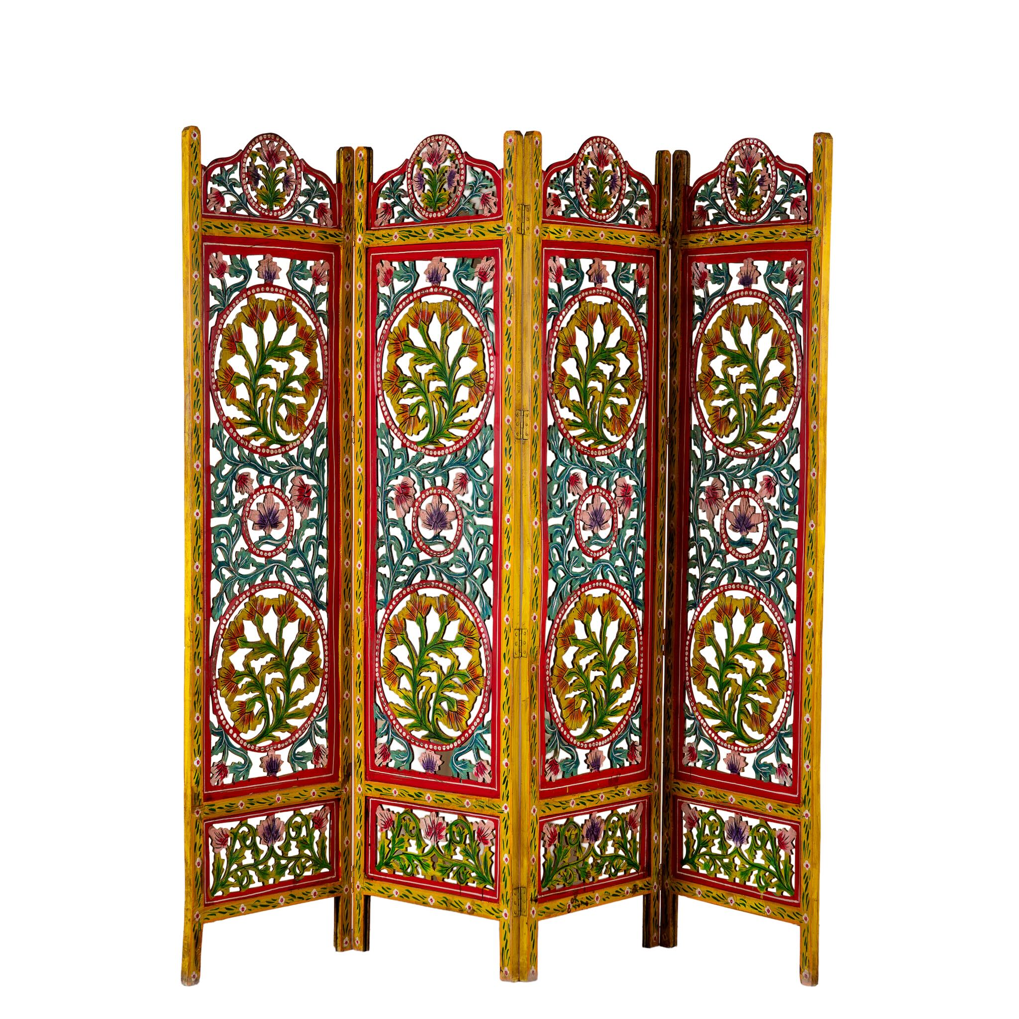 White background image of a hand carved and hand painted mango wood room divider with colourful floral Indian motifs and folding panels.