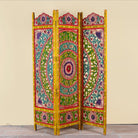 Hand carved and hand painted mango wood room divider with colourful floral Indian motifs and folding panels.