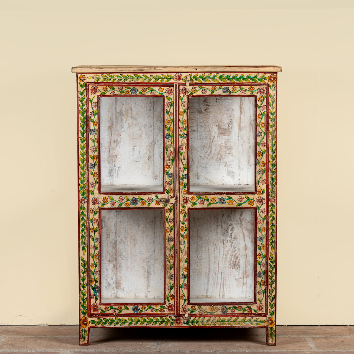 Nikhil hand painted reclaimed wood display cabinet with colourful floral design and four open display sections 120cm