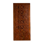 Wooden door with geometric lattice design on a white background