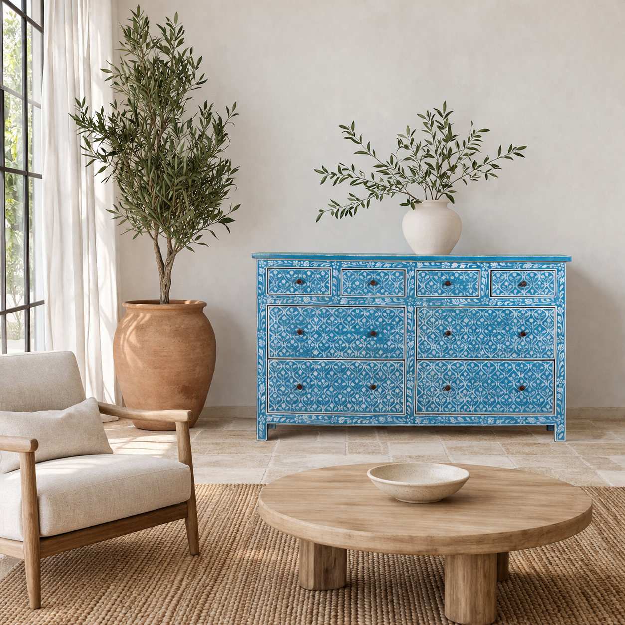 Lifestyle imagination of a hand-painted chest of drawers made of reclaimed wood in blue and white – Nitara model by Om Home & Garden