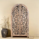 Hand-carved mango wood wardrobe, a statement piece of bedroom furniture ideal for a bohemian interior.