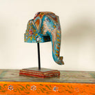 Hand-painted decorative wooden elephant head on iron stand with floral Indian folk art – ideal for Indian and vintage home accessories.