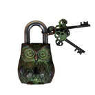 Decorative owl-shaped padlock with a key on a white background