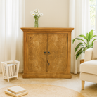 Lifestyle imagination of a mango wood cabinet with floral hand-carved doors in Mediterranean style, 90 × 90 × 40 cm – made from solid mango wood with unique grain and texture.