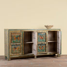 Side angle image showing open doors of a Pavan hand-painted reclaimed wood sideboard with original Indian teak doors and colourful tiger, camel, elephant, horse and lion motifs 193cm