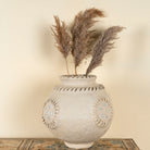 Handmade papier-mâché vase Peda with mirror-inlaid medallions and textured rim. A vintage home accessory and unique Indian decoration, perfect for dried flowers or as a sculptural accent in vintage home decor.