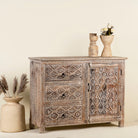 Side angle image of a mango wood furniture sideboard with hand-carved detailing and distressed style finish, vintage furniture storage cabinet, 120 × 40 × 90 cm.