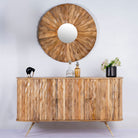Handmade mango wood sideboard with live-edge design, brass-coated base, and handles—an artisanal furniture piece combining natural and modern elements.