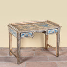 Side angle image of a Pranay hand painted reclaimed wood desk with blue and white floral motifs and two drawers 114cm