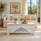 Lifestyle image of a Hand-carved mango wood vintage chest with floral detailing – a one-of-a-kind mango wood chest ideal for Mediterranean-inspired interiors.