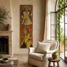 Lifestyle image of a hand-painted reclaimed teak wall panel with Indian Maharaja-inspired motifs, crafted from an antique door for unique cultural wall décor.