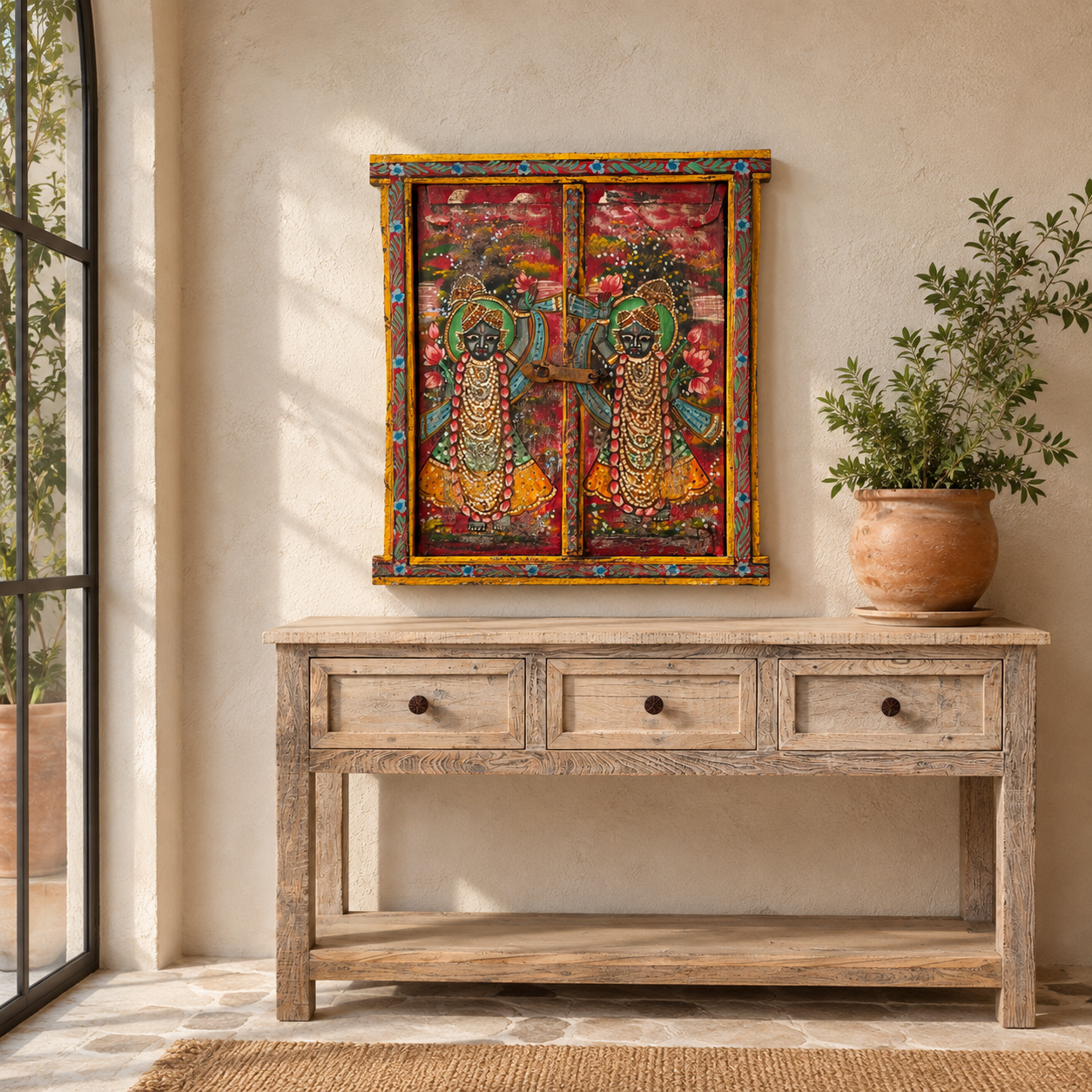 Lifestyle image of a Radha and Krishna antique reclaimed wood mirror with hand-painted Indian artwork on an authentic vintage reclaimed wooden mirror frame, 50x50x5cm.