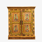 White background image of a hand painted reclaimed wood cabinet with floral design in vintage style.