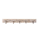 White background image of a hand-carved reclaimed wood wall hook rack crafted from an antique Indian architectural element with five iron hooks, intricate floral carvings, bleached finish, and vintage rustic character, 150cm.