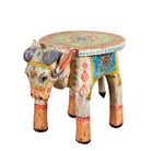 White background image of a hand-painted wooden Ram side table in the shape of a ram with curved horns, featuring colourful Indian folk art patterns, ideal for vintage and India-inspired home accessories.