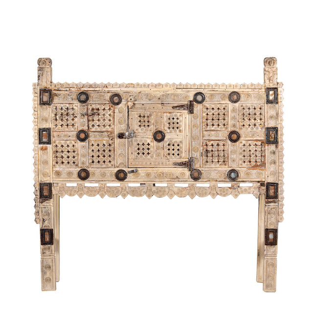 White background image of a sandblasted antique Indian teak chest with hand-carved details, original iron fittings, and a naturally aged finish, ideal for bohemian or vintage-inspired interiors.