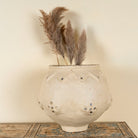Handmade papier-mâché vase Rasgulla with rounded shape, zigzag embossing, and mirrored inlays. A vintage home accessory and unique Indian decoration ideal for dried flowers or as a sculptural element in vintage home decor.