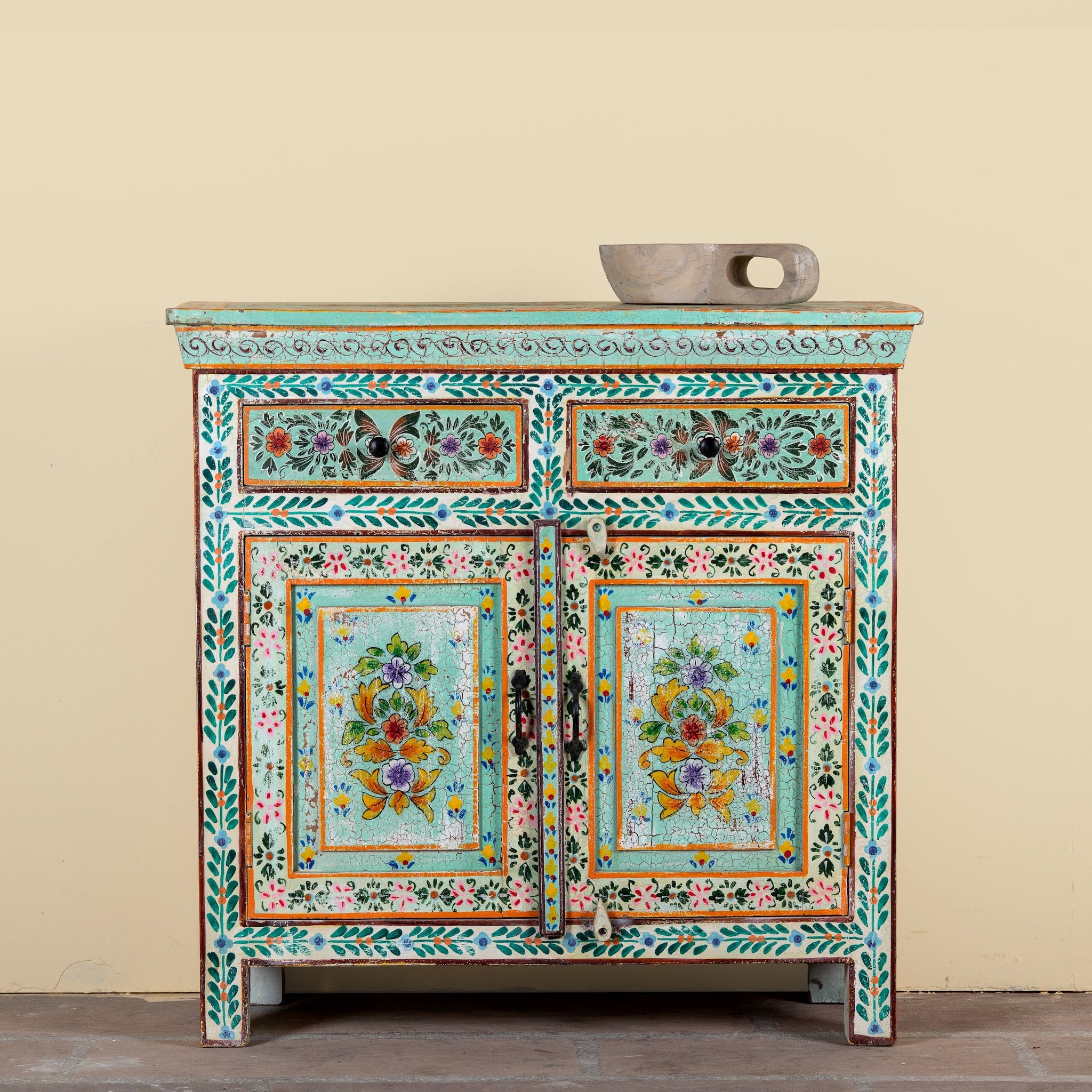 Hand painted green Indian cabinet made from recycled wood with floral motifs, 2 drawers and 2 compartments, 90 × 90 × 40 cm.