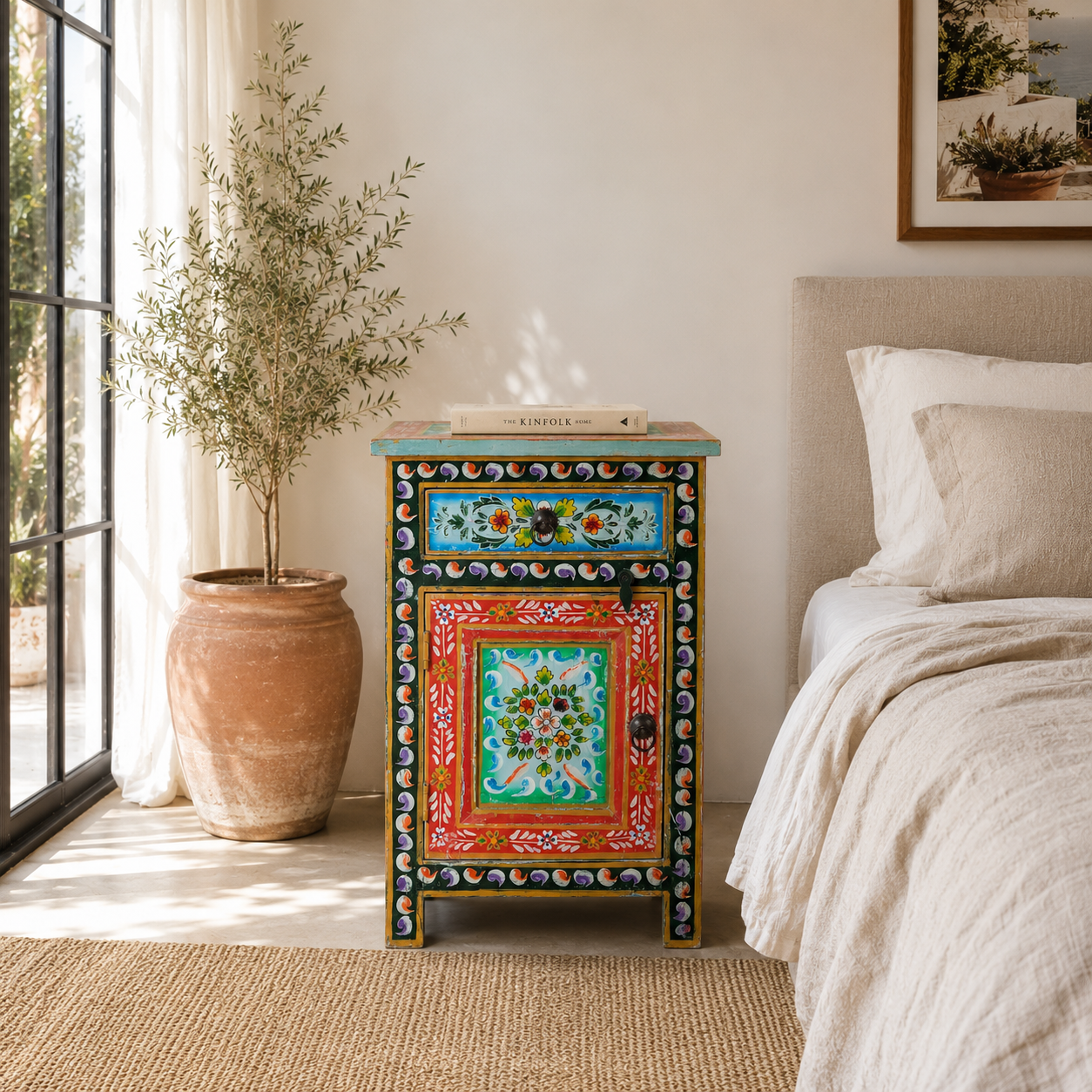 Lifestyle scene with a hand-painted bedside table made from recycled wood – vintage night stands with carved mango wood furniture detailing and floral artistry.
